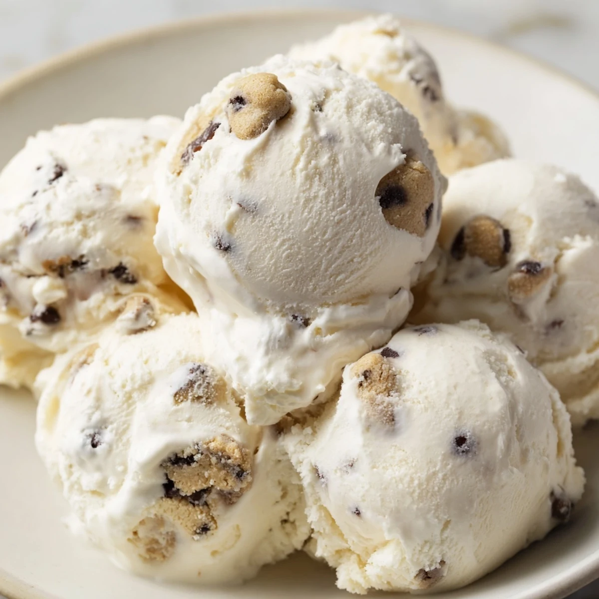 Creamy Cottage Cheese Ice Cream with cookie dough bites, a delicious guilt-free treat.  
