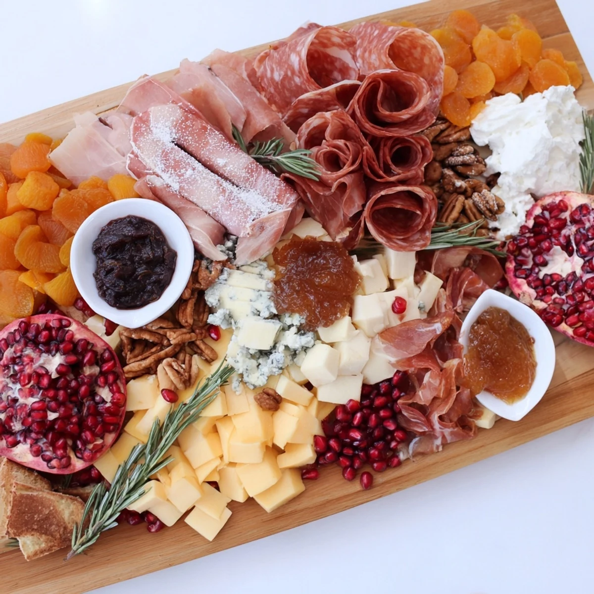 A winter forest charcuterie scene featuring beautifully arranged meats and cheeses, perfect for a cozy gathering.