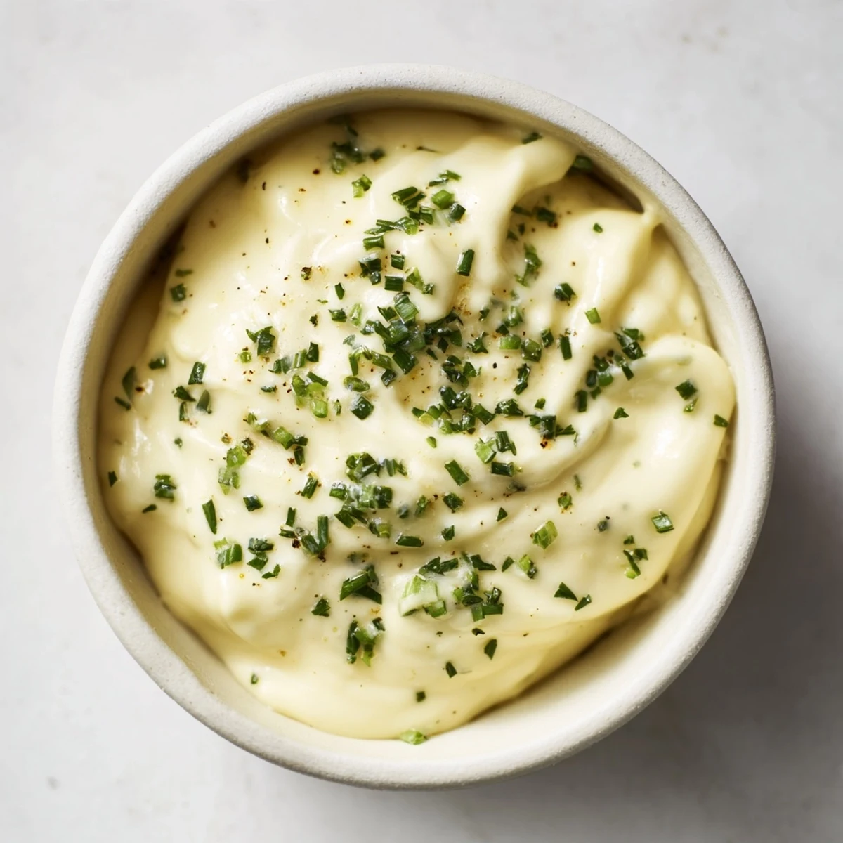 Vibrant veggie ranch dip with colorful vegetables like carrots and celery for dipping, appealing and delicious.