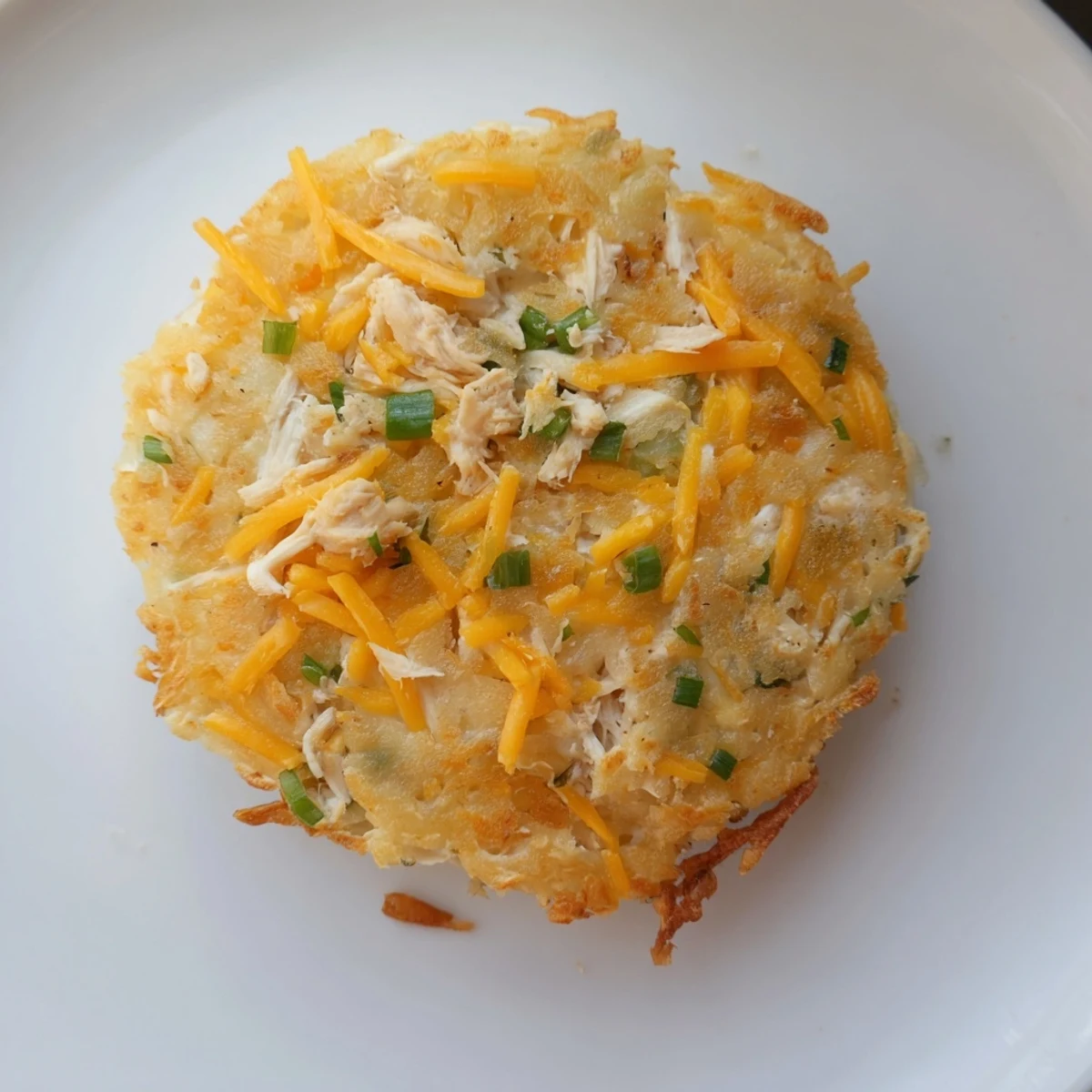 Perfectly fried Potato and Chicken Cakes, featuring tender chicken and creamy potato, ready to be enjoyed.