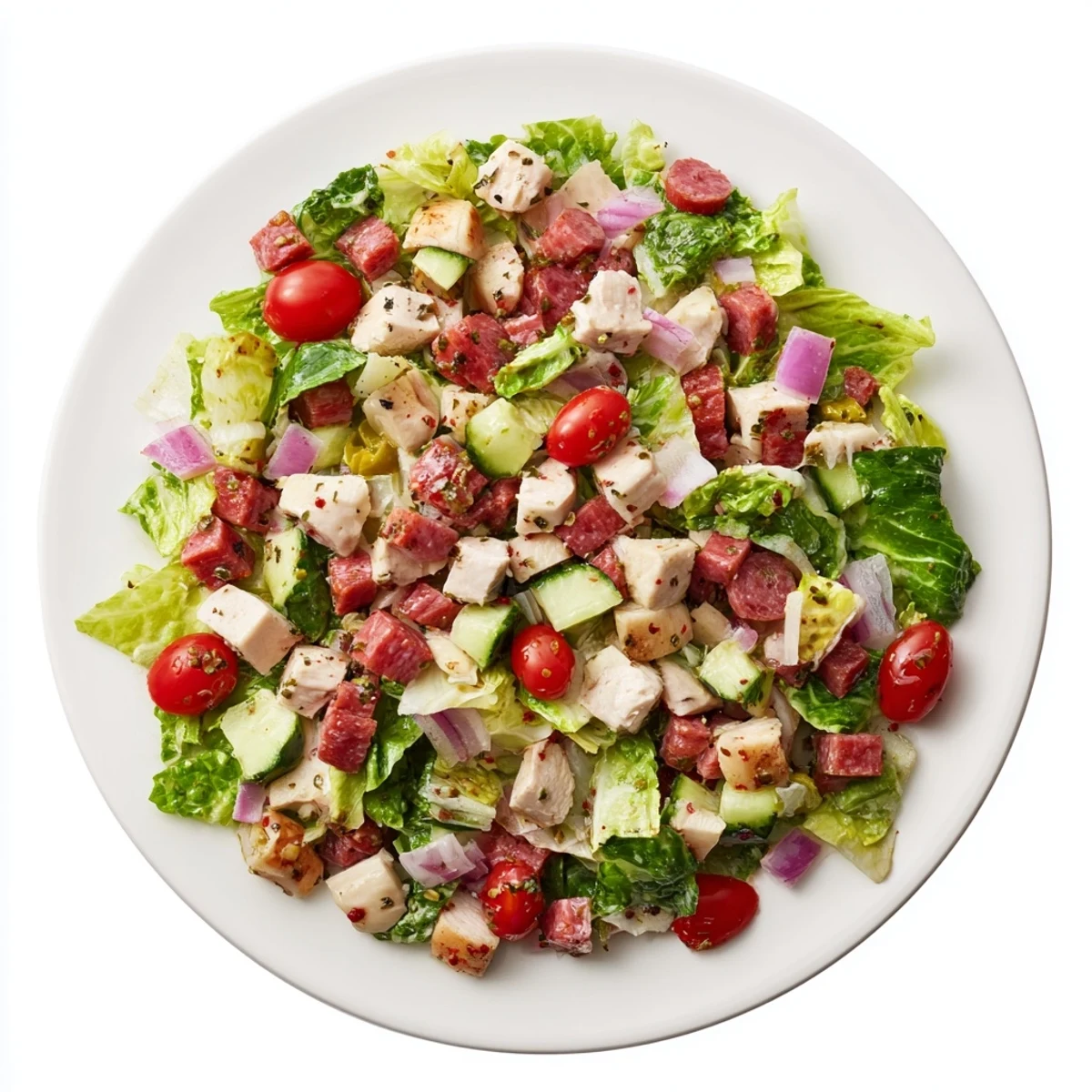 Serving suggestion for Italian Deli Chopped Chicken Salad, plated as a main dish with chopped chicken, salami, and provolone over crisp romaine and colorful vegetables.