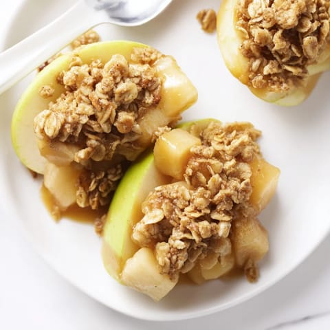 Warm, tender apples drizzled with maple bourbon caramel, perfect for cozy nights.  