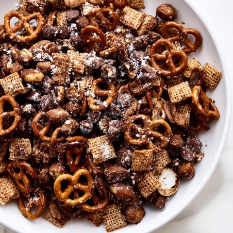 A close-up of a delightful Festive Pine Cone Snack Mix, perfect for holiday snacking sessions.