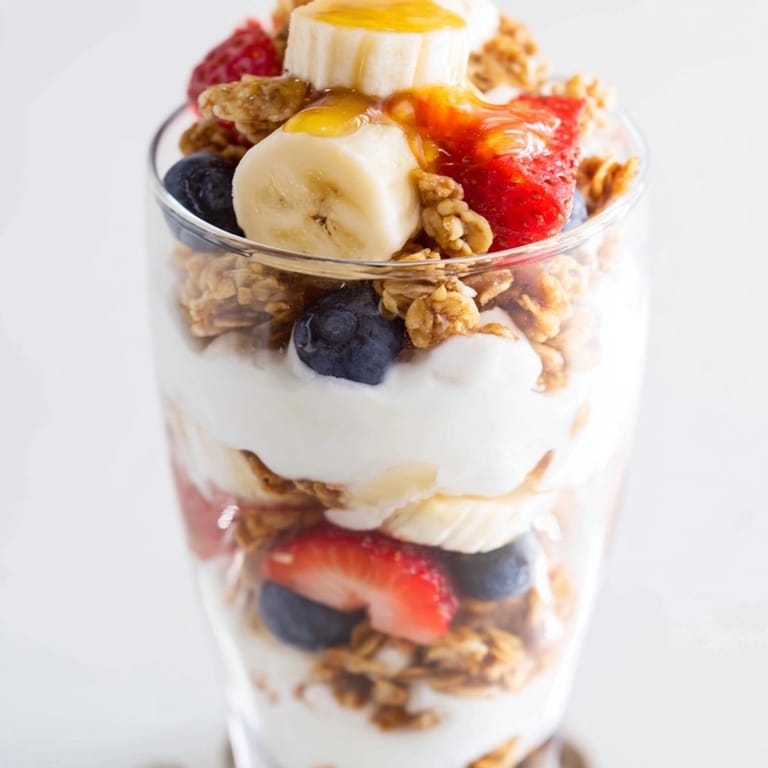 Swirls of cool Yogurt Parfait with sweet fruit; easy, quick customizable breakfast.